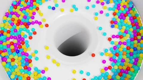 Multi-colored balls fall and are collected in a hole in the center. 3D render. Video stock 255142606