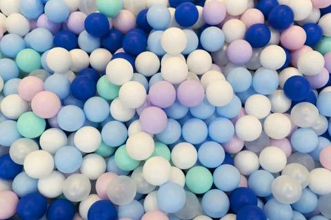 Multi-colored balls in the pool top view Stock Photos