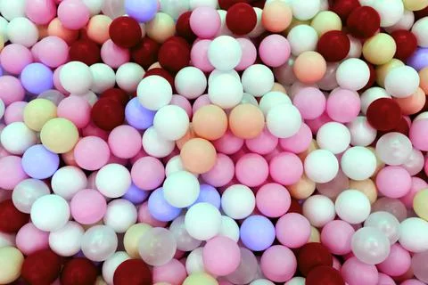 Multi-colored balls in the pool top view Stock Photos