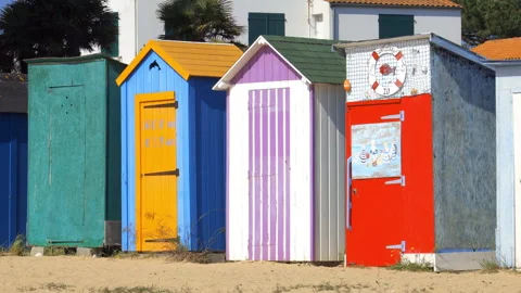 Multi colored beach huts of the beach of La Boirie on Ile d'Oleron, France Stock Footage 277258116