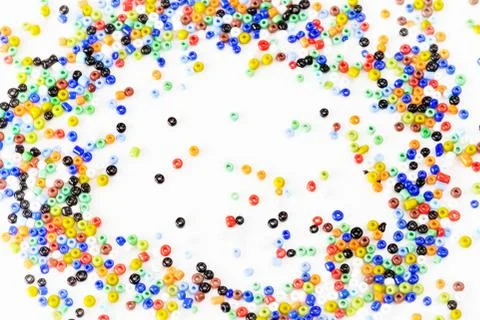 Multi-colored beads on white Stock Photos