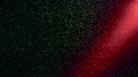 Multi-colored beams of light blink on a dark background. Stock Footage 195699994