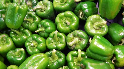 Multi Colored Bell Pepper Placed on Shelves at Conventional Market Stock Footage 98651499