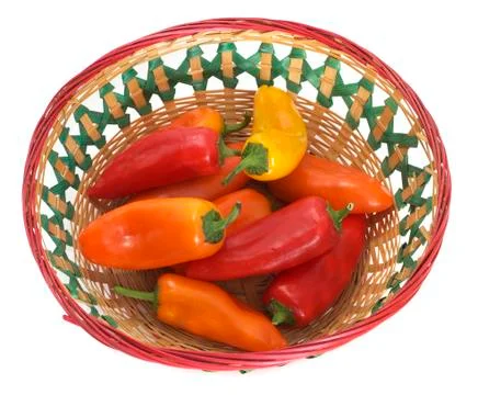 Multi colored bell peppers in basket Stock Photos