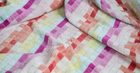 Multi-colored big terry cotton towel close up Stock Photos