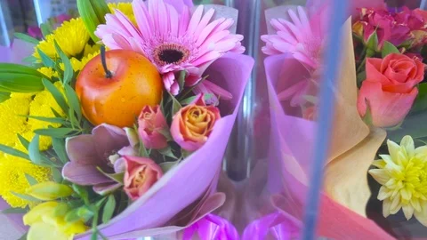 Multi-colored bouquets of flowers in motion. Beautiful floral 스톡 동영상 70014100