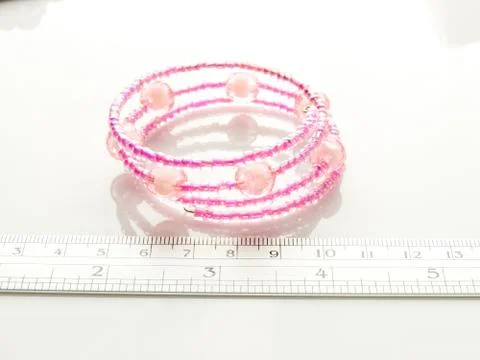 Multi-colored bracelets with beads. Colourful child's bead bracelet.. Foto stock