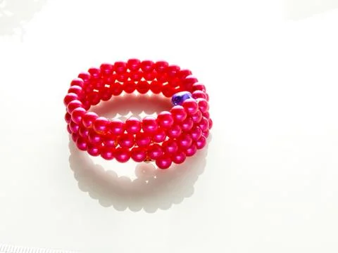 Multi-colored bracelets with beads. Colourful child's bead bracelet.. Stock Photos