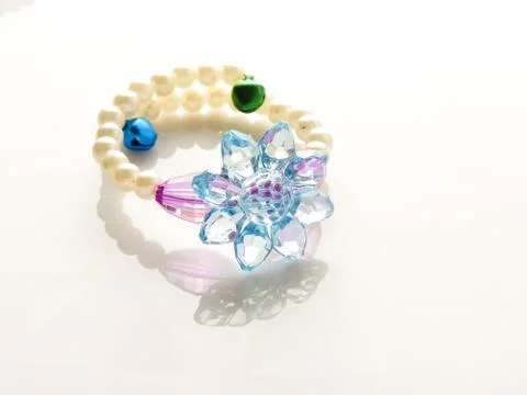 Multi-colored bracelets with beads. Colourful child's bead bracelet.. Stock Photos