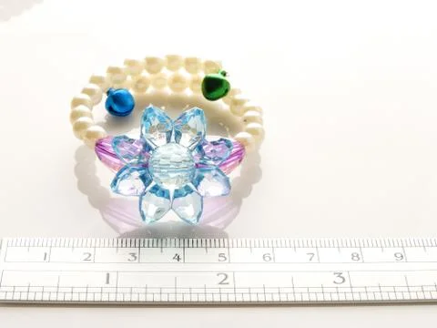Multi-colored bracelets with beads. Colourful child's bead bracelet.. Stock Photos