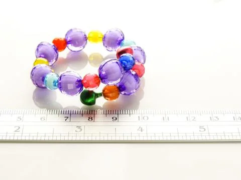 Multi-colored bracelets with beads Stock Photos