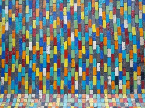 Multi-colored brick wall, many colored background, background texture, Colorf Stock Photos