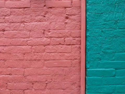 Multi-colored brick wall on the street Stock Photos