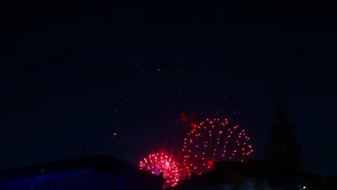 Multi-colored bright fireworks sparks of silver and red on the dark sky ove.. Video stock 281581542