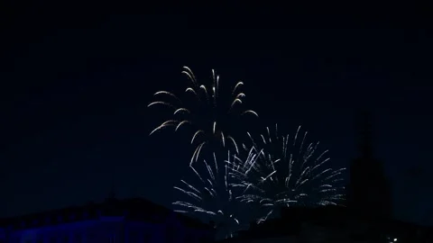 Multi-colored bright fireworks sparks of silver and red and blue colors on .. 库存影片 284031762