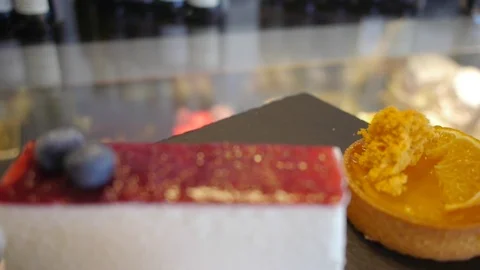 Multi-colored cakes in Portugal. Stockbeeldmateriaal 122201768