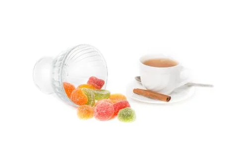 Multi-colored candy and tea Stock Photos