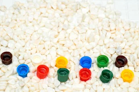 Multi colored caps lids for ketchup, mayonnaise, mustard, sauces Stock Photos