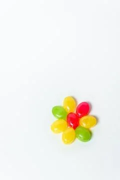 Multi-colored caramel on a white background Stock Photos