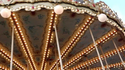 Multi-colored carousel lights at a fair closeup Stock Footage 123143384