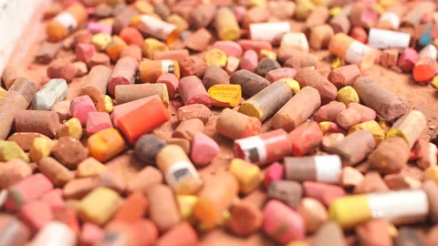 Multi-colored chalk on a gray background close-up. side view. Stock Footage 89697008