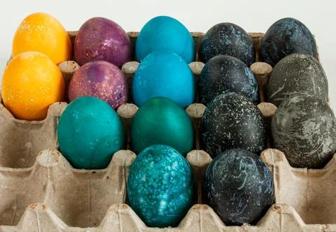Multi-colored chicken eggs. Feast of Light Easter. Background. Stock Photos