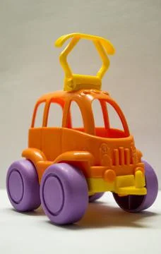 A multi-colored children's designer is lying on a white light table Stock Photos