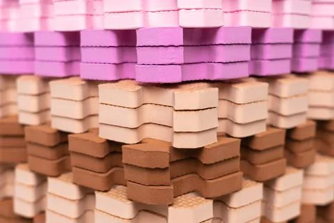 Multi-colored children's rugs in a stack. Stock Photos