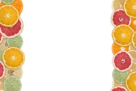 Multi-colored citrus slices on a white background 写真素材