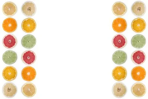 Multi-colored citrus slices on a white background 写真素材