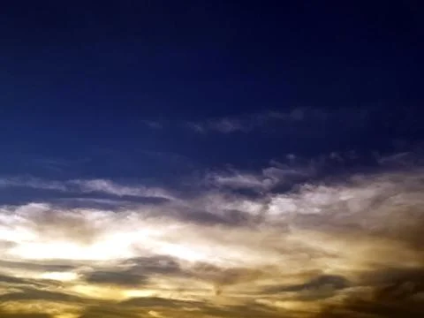 Multi colored clouds in the sky Stock Photos
