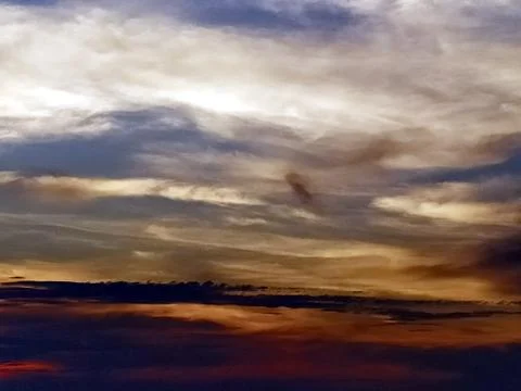 Multi colored clouds in the sky Stock Photos