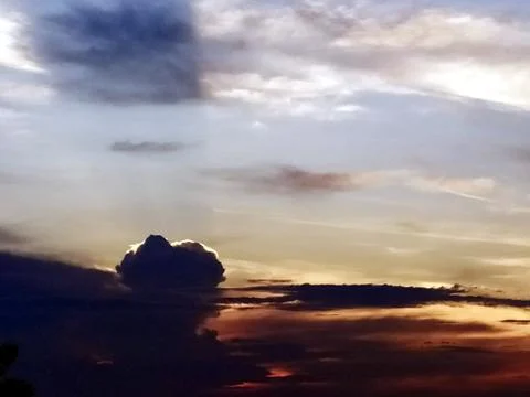 Multi colored clouds in the sky Stock Photos