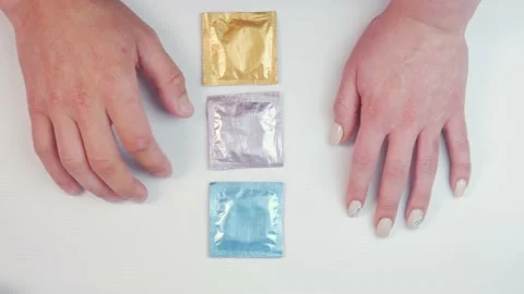 Multi-colored condoms Stock Footage 181068270