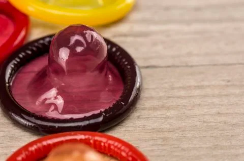 Multi colored condoms Stock Photos