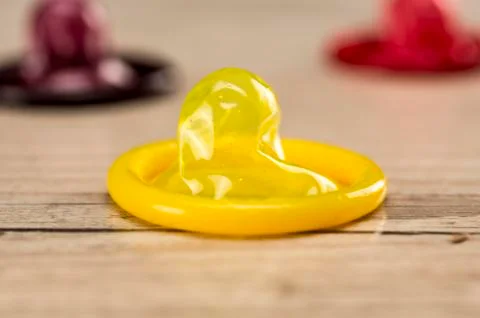 Multi colored condoms Stock Photos