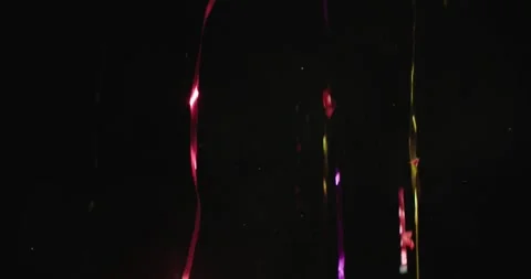 Multi colored Confetti explosion on black background Video stock 331987899