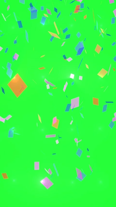 Multi-colored confetti falling on a green screen. Stock Footage 311528412