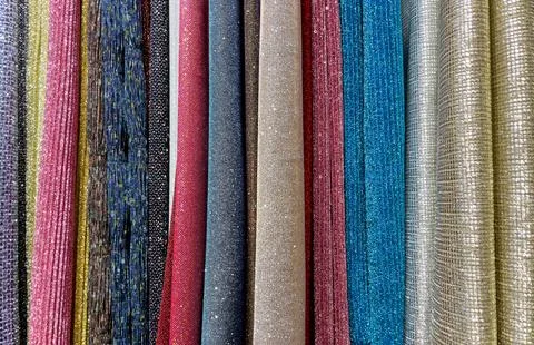 Multi-colored curtains in the store. Stock Photos