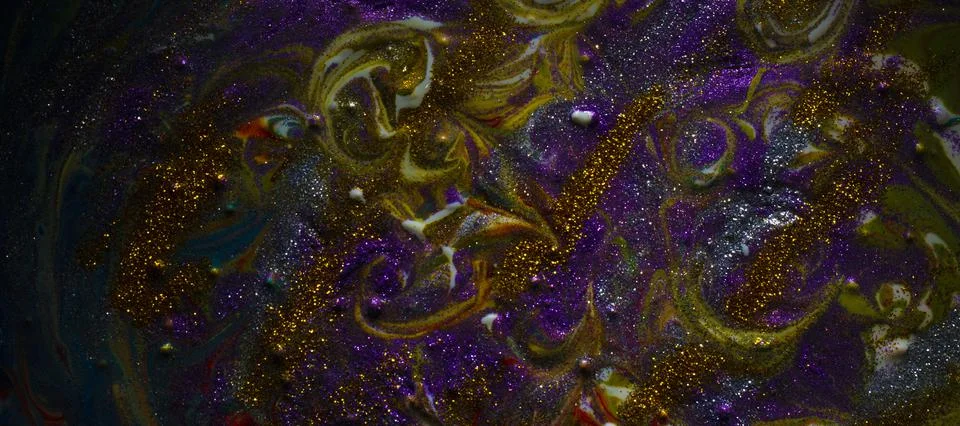 Multi-colored dark background sprinkled with purple and gold sparkles. Contem Stock Photos