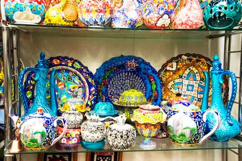 Multi-colored decorative Turkish Oriental ornamental ceramic ware on the shel Stock Photos