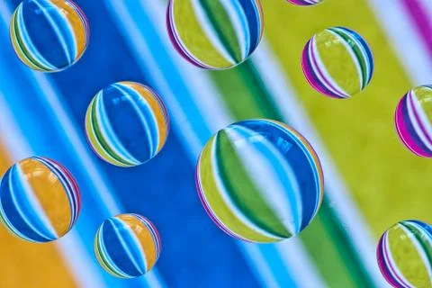 Multi-colored drops of water. Stock Photos