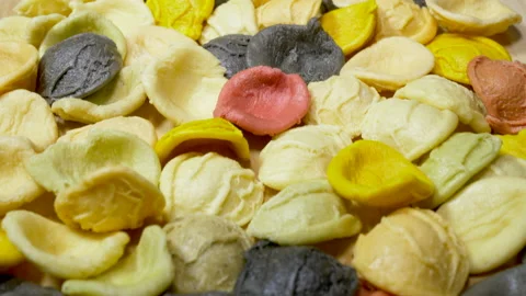 Multi colored dry pasta shell shapes. Stock Footage 143454106