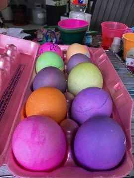 Multi-Colored Easter Eggs in an Egg Carton Stock Photos