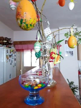 Multi colored Easter eggs in a kitchen with selective focus Stock Photos