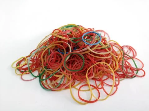 Multi-colored elastic to fasten things on a white background, isolated. Stock Photos