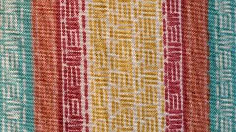 Multi-colored fabric with a pattern 스톡 사진