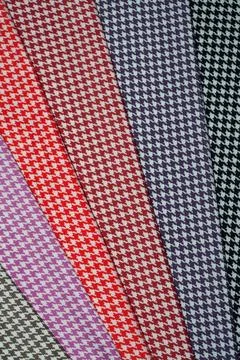 Multi-colored fabric patterns with geometric pattern for sewing. Foto stock