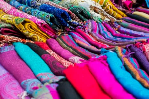 Multi-colored fabrics on a show-window Stock Photos