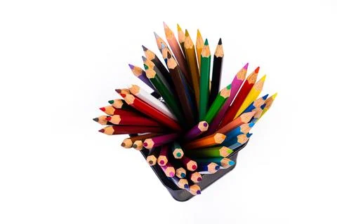 Multi-colored felt-tip pens in a glass on a white background, close-up, copy Stock Photos